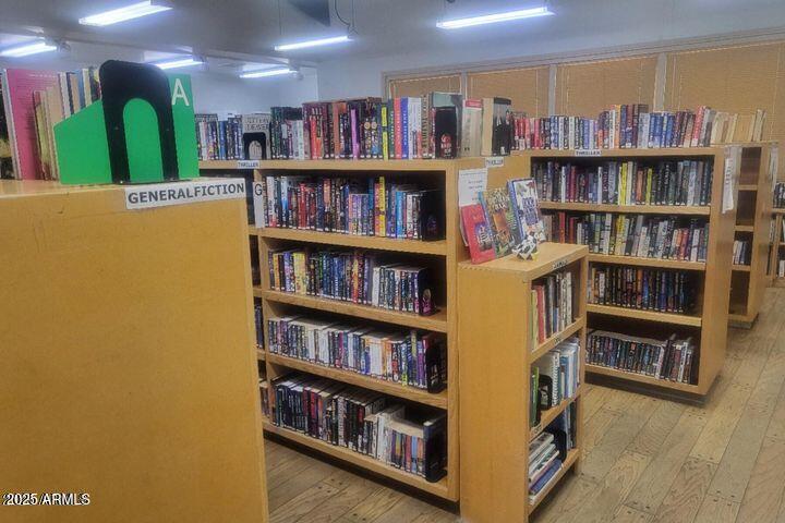 17200 West Bell Road, Unit 330 Surprise, AZ 85374 - Photo 34 of 39 a view of a book shelf with lots of books