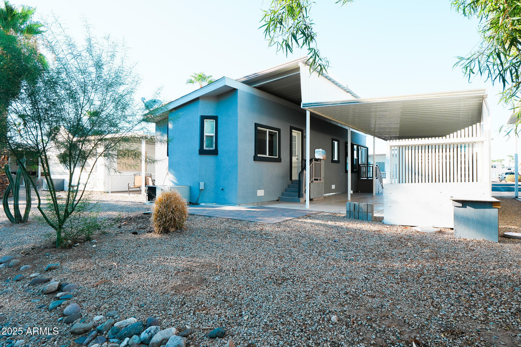 17200 West Bell Road, Unit 330 Surprise, AZ 85374 - Photo 7 of 39 a view of a house with a yard and tree