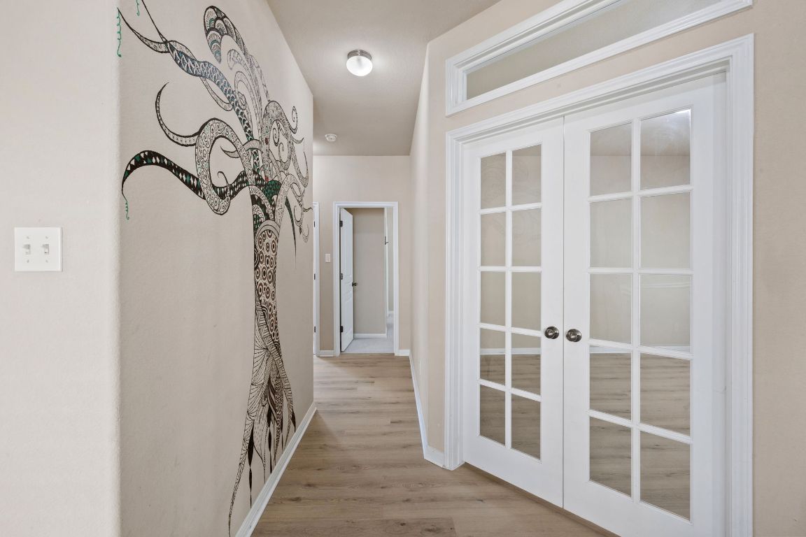 1900 Main Street Cedar Park, TX 78613 - Photo 20 of 34 a view of a house with a window and wooden floor