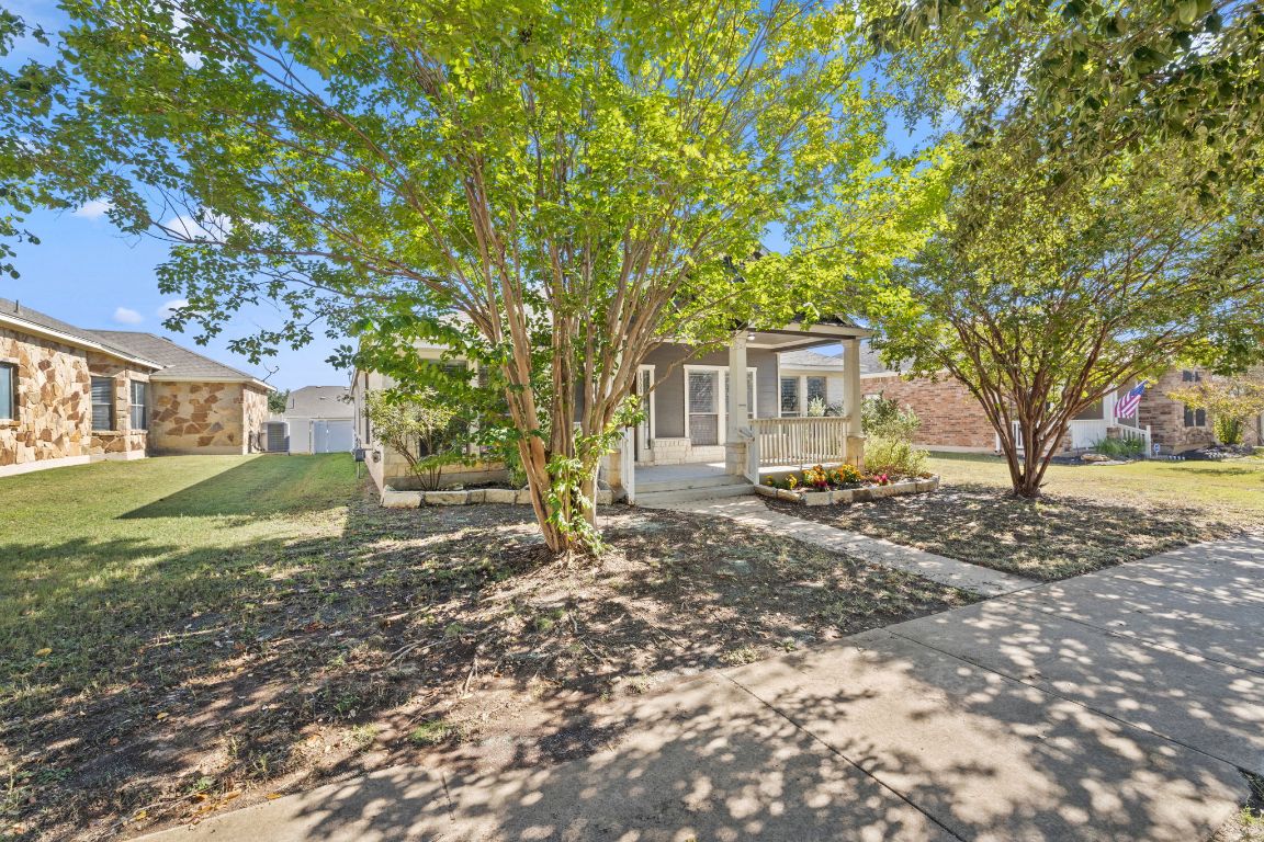 1900 Main Street Cedar Park, TX 78613 - Photo 2 of 34 a view of a house with a yard
