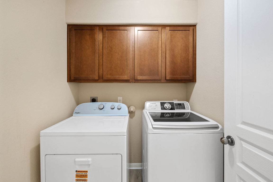 1900 Main Street Cedar Park, TX 78613 - Photo 27 of 34 a utility room with dryer and washer