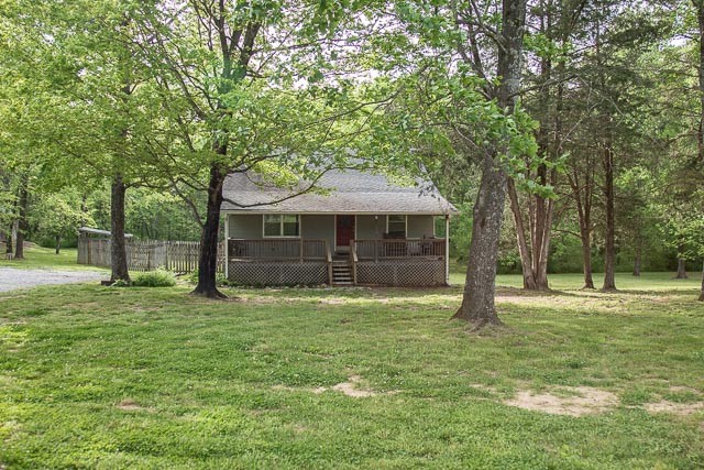 3220 Les Chappell Road Spring Hill, TN 37174 - Photo 12 of 70 a front view of a house with a garden