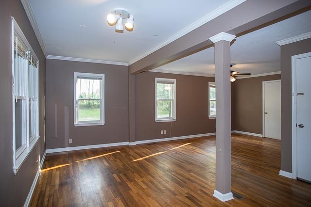 3220 Les Chappell Road Spring Hill, TN 37174 - Photo 18 of 70 a view of an empty room with wooden floor and a window