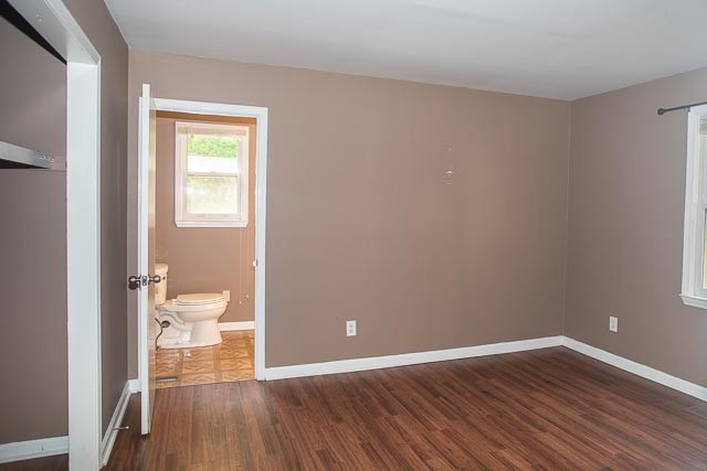 3220 Les Chappell Road Spring Hill, TN 37174 - Photo 21 of 70 a view of a room with wooden floor and bathroom view