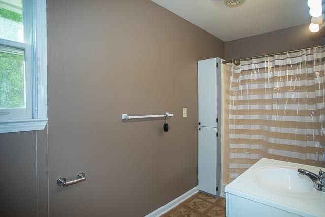 3220 Les Chappell Road Spring Hill, TN 37174 - Photo 23 of 70 a bathroom with a shower and a sink