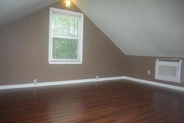 3220 Les Chappell Road Spring Hill, TN 37174 - Photo 31 of 70 a view of an empty room with wooden floor and a window