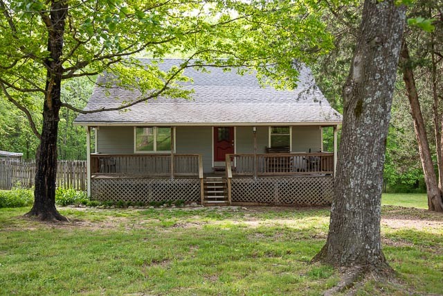3220 Les Chappell Road Spring Hill, TN 37174 - Photo 5 of 70 a front view of a house with a garden