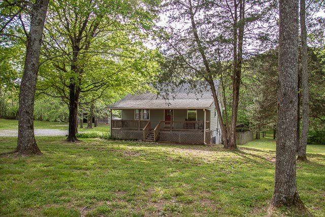 3220 Les Chappell Road Spring Hill, TN 37174 - Photo 7 of 70 a view of a house with a yard