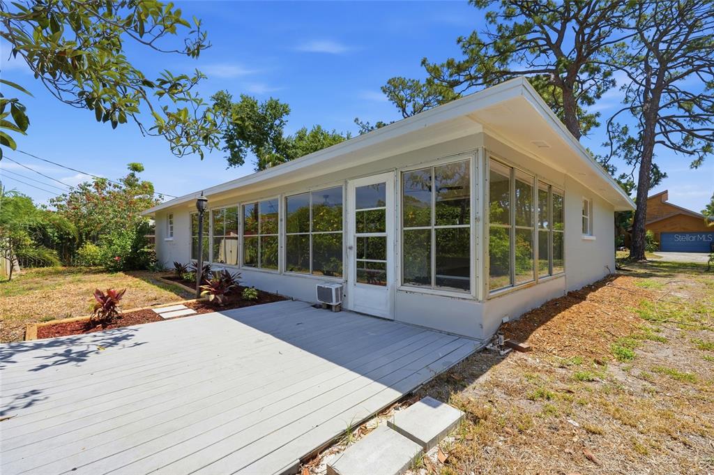 5984 Diana Road Venice, FL 34293 - Photo 29 of 36 a view of a house with a backyard
