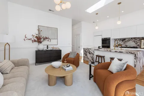 a living room with furniture and a couch