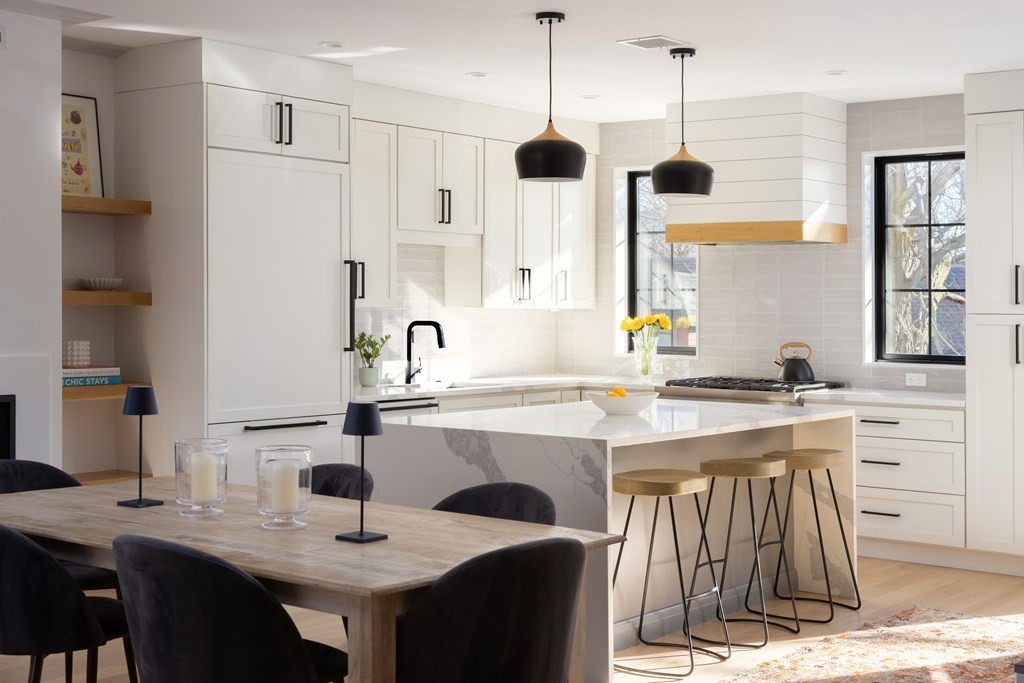 a kitchen with a sink stove and refrigerator