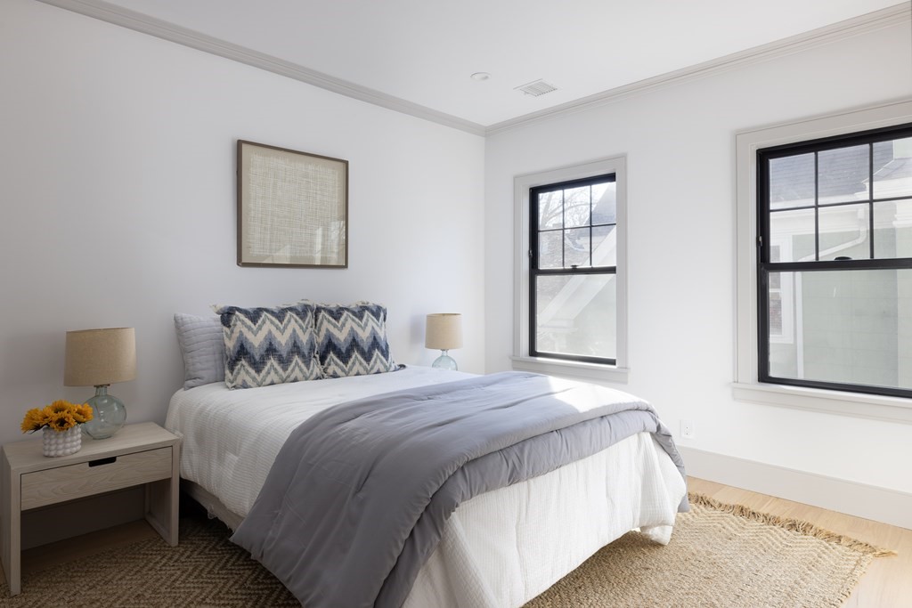 21 Naples Road, Unit 2 Brookline, MA 02446 - Photo 11 of 21 a bedroom with bed and window