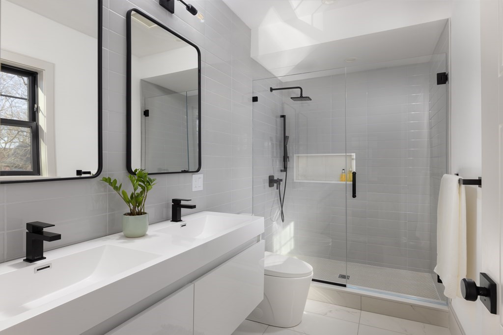 21 Naples Road, Unit 2 Brookline, MA 02446 - Photo 12 of 21 a bathroom with a sink toilet and shower