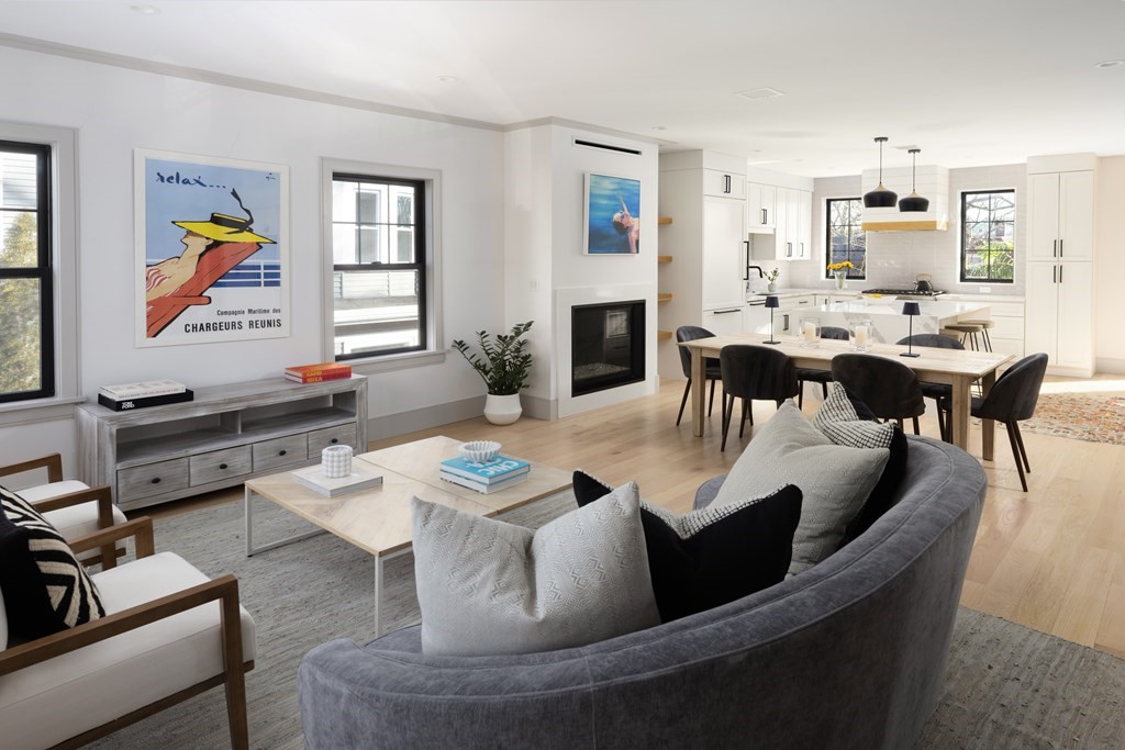 21 Naples Road, Unit 2 Brookline, MA 02446 - Photo 8 of 21 a living room with furniture and a flat screen tv