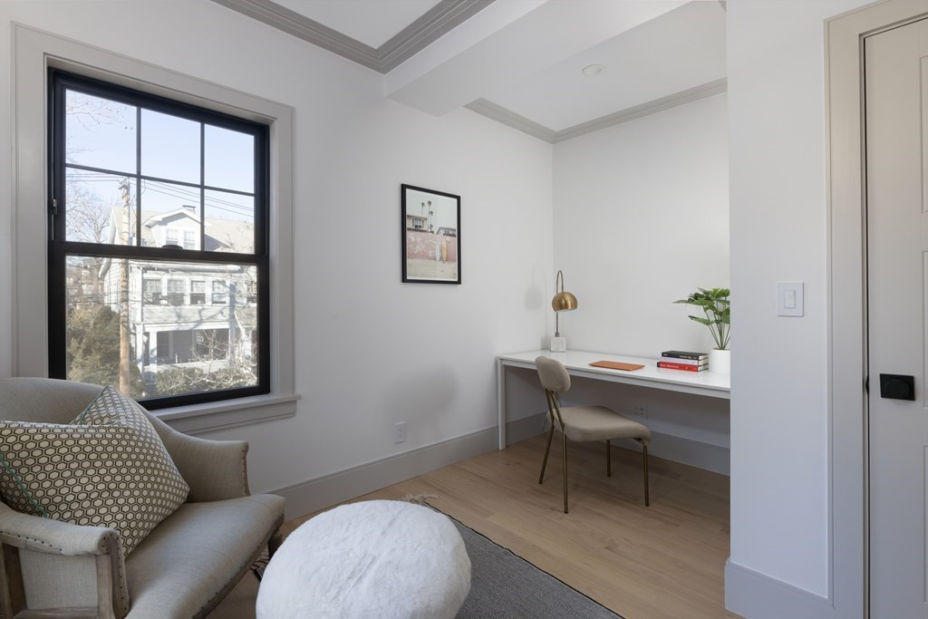 21 Naples Road, Unit 2 Brookline, MA 02446 - Photo 10 of 21 a living room with furniture and a window