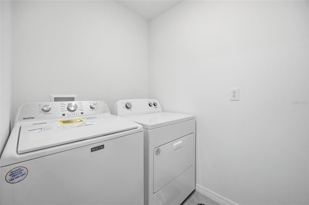 16402 Southwest 17th Terr Road Ocala, FL 34473 - Photo 26 of 36 a utility room with dryer and washer