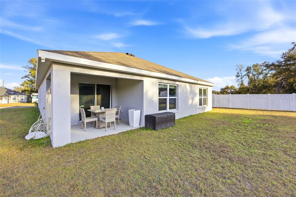 16402 Southwest 17th Terr Road Ocala, FL 34473 - Photo 28 of 36 a view of a house with patio