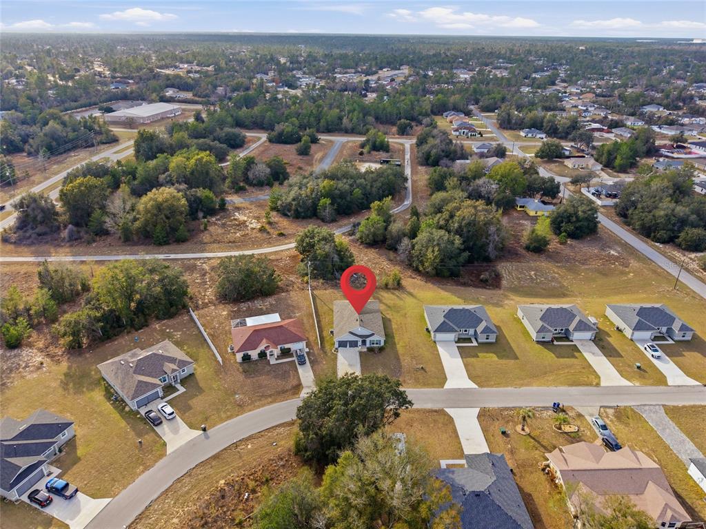 16402 Southwest 17th Terr Road Ocala, FL 34473 - Photo 32 of 36 an aerial view of residential houses with outdoor space