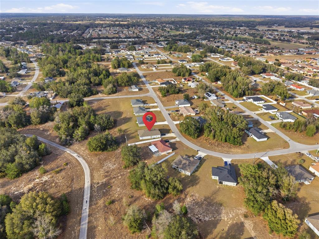 16402 Southwest 17th Terr Road Ocala, FL 34473 - Photo 35 of 36 an aerial view of residential houses with outdoor space