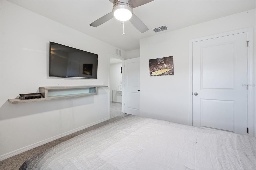 16402 Southwest 17th Terr Road Ocala, FL 34473 - Photo 9 of 36 a view of living room with flat screen tv