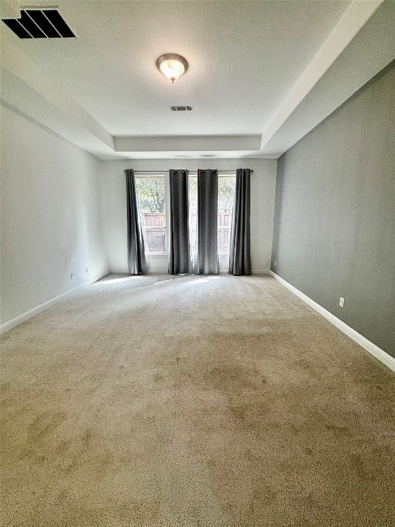 13326 Lake Chesdin Road Houston, TX 77044 - Photo 21 of 29 a view of an empty room with window and a kitchen