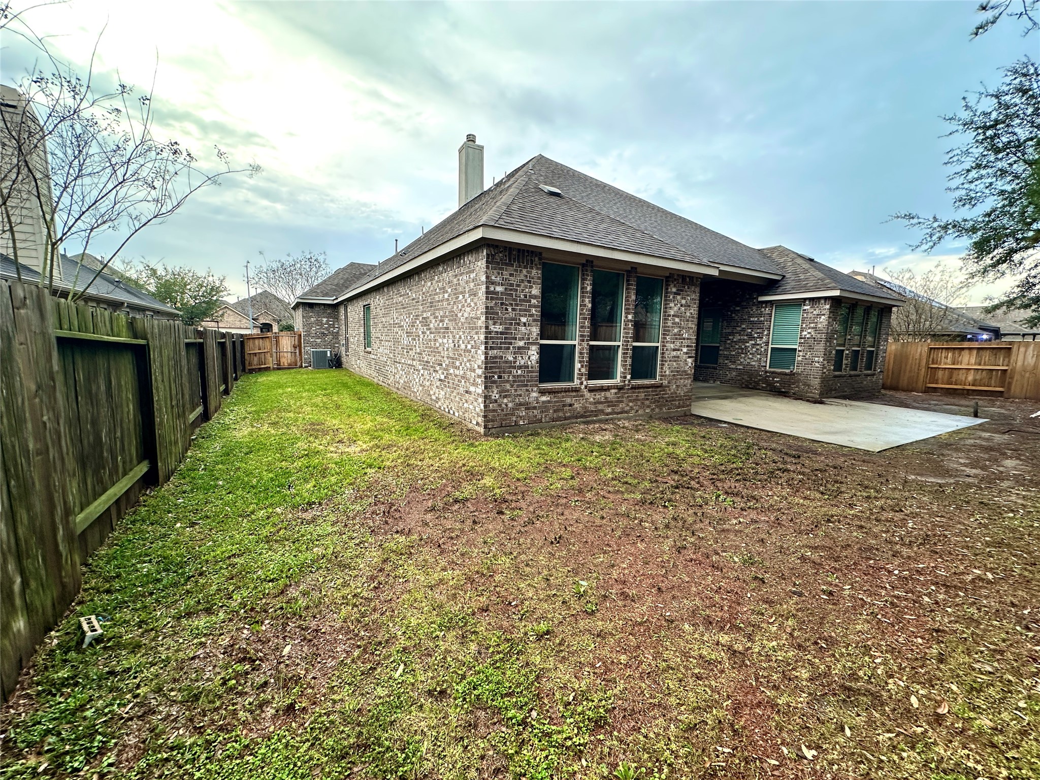 13326 Lake Chesdin Road Houston, TX 77044 - Photo 26 of 29 a view of a house with a yard and large trees