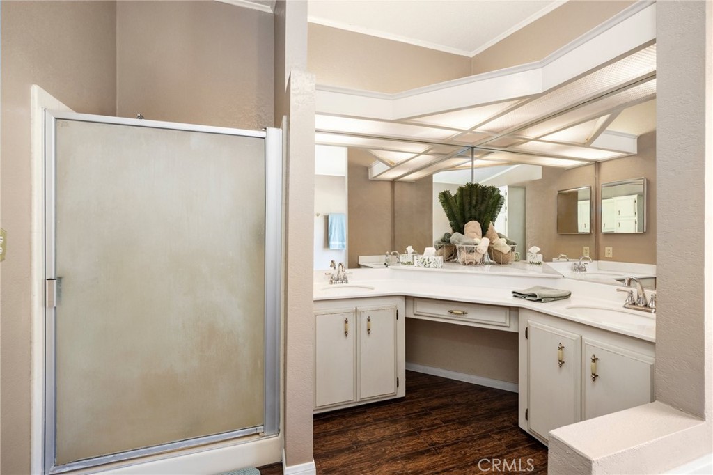 33415 Oracle Hill Road Palmdale, CA 93550 - Photo 21 of 44 a kitchen with a sink and a mirror