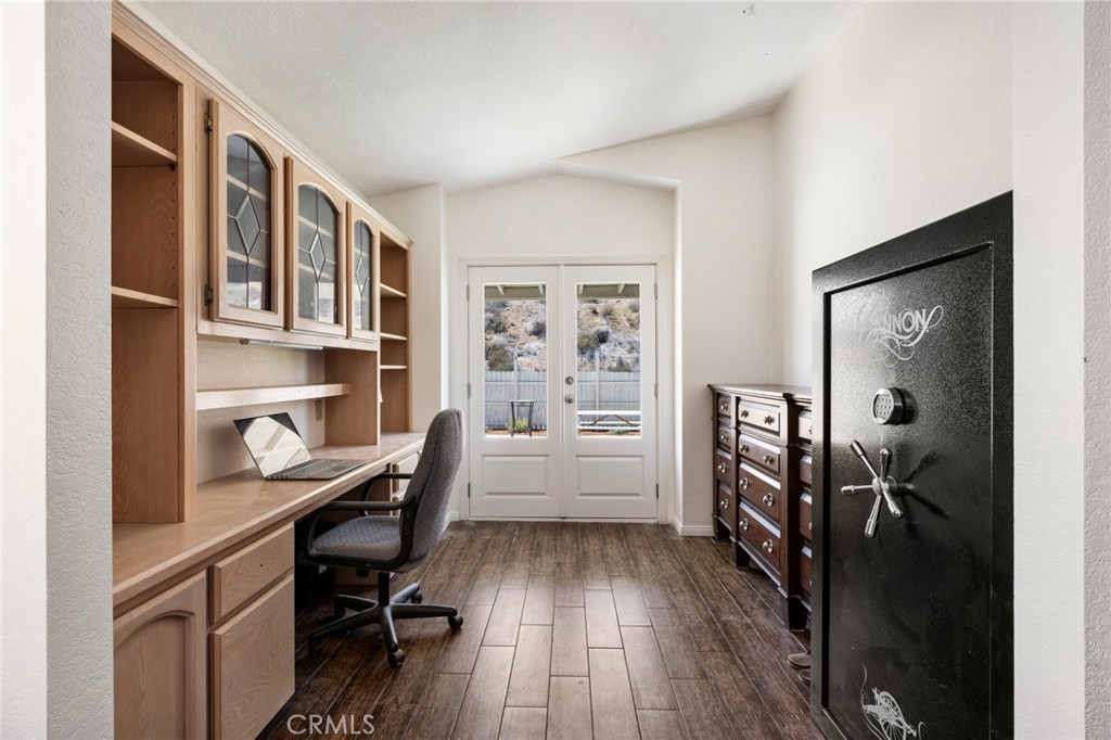 33415 Oracle Hill Road Palmdale, CA 93550 - Photo 22 of 44 a view of a workspace with furniture and a window