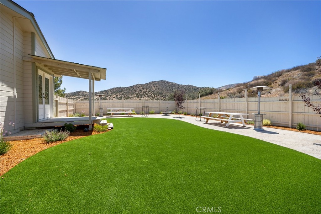 33415 Oracle Hill Road Palmdale, CA 93550 - Photo 23 of 44 a view of back yard of the house