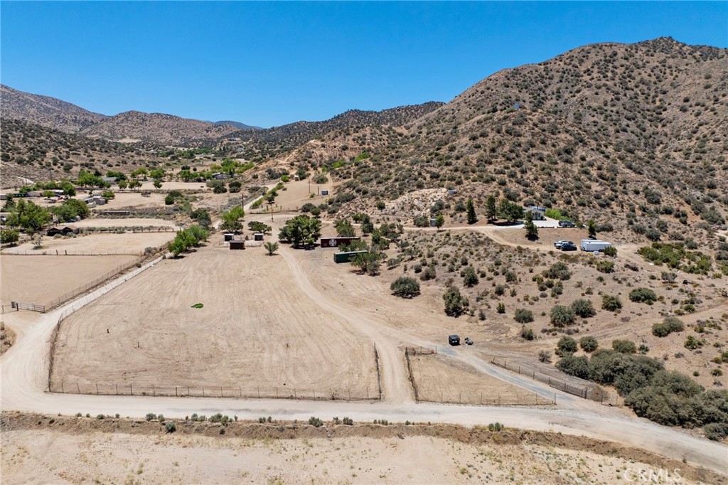 33415 Oracle Hill Road Palmdale, CA 93550 - Photo 33 of 44 a view of a dry yard with mountain view