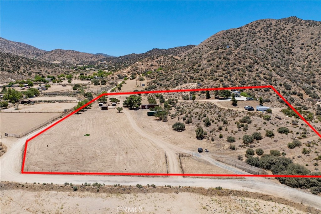 33415 Oracle Hill Road Palmdale, CA 93550 - Photo 34 of 44 a view of a road with a mountain in the background