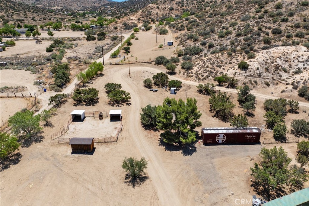 33415 Oracle Hill Road Palmdale, CA 93550 - Photo 35 of 44 an aerial view of a house with a yard and lake view