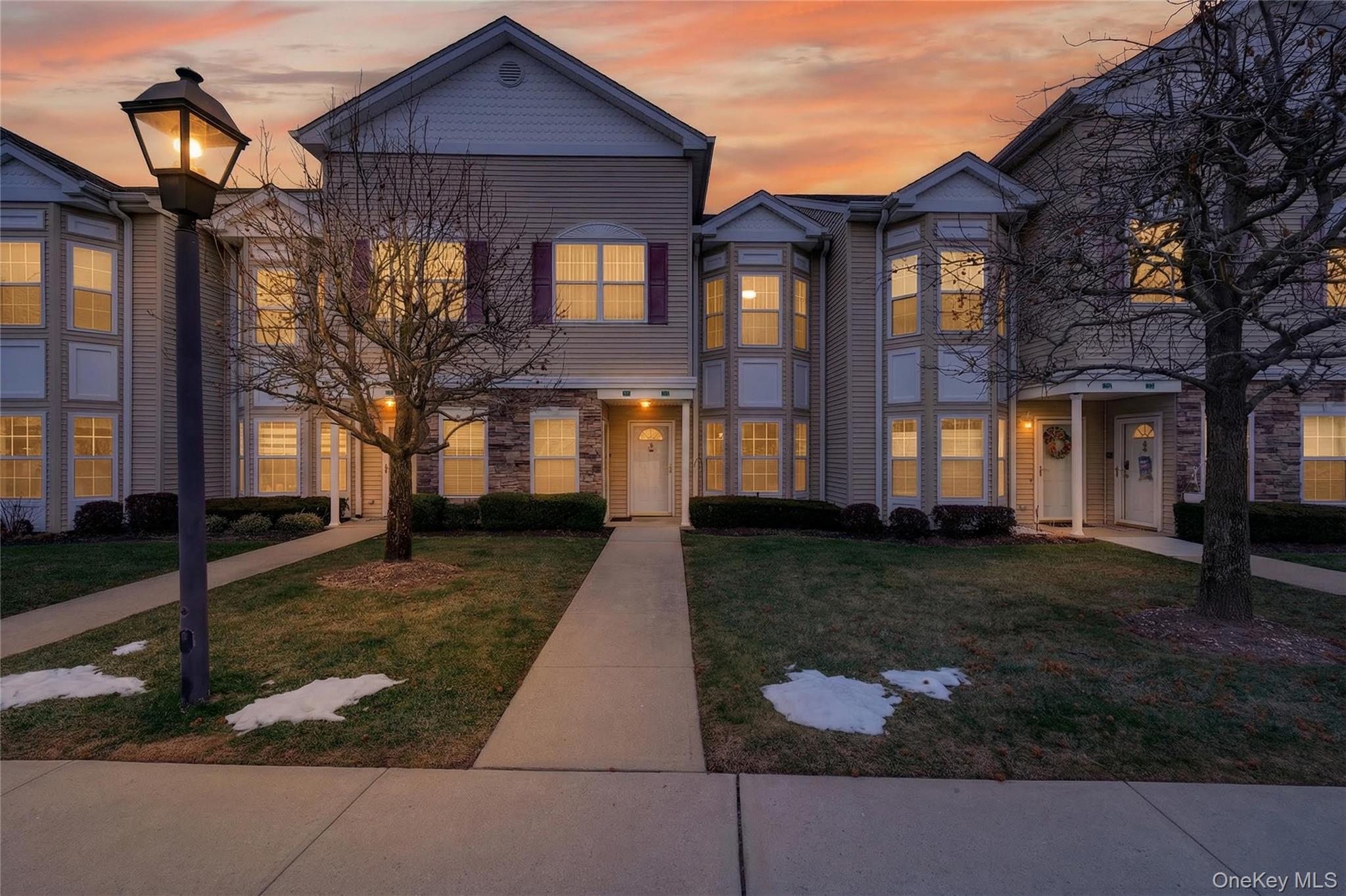 View of front of home with a yard