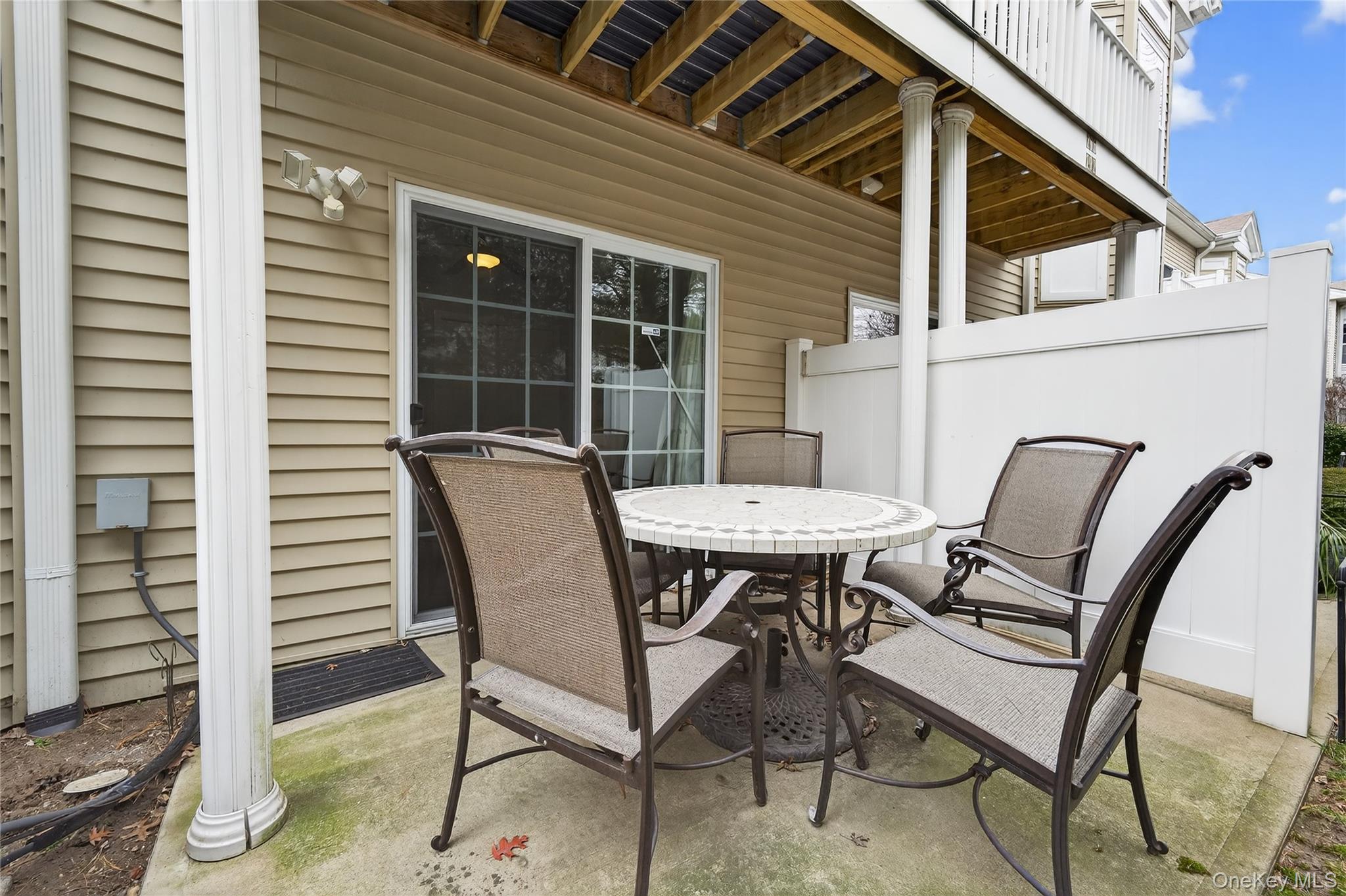 294 Spring Drive East Meadow, NY 11554 - Photo 24 of 31 View of patio with outdoor dining space