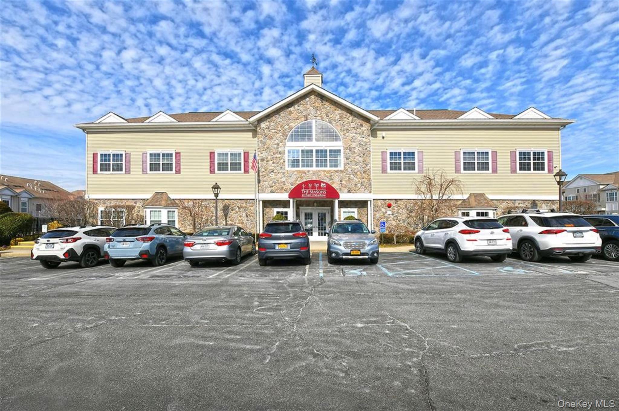 294 Spring Drive East Meadow, NY 11554 - Photo 27 of 31 View of property with uncovered parking