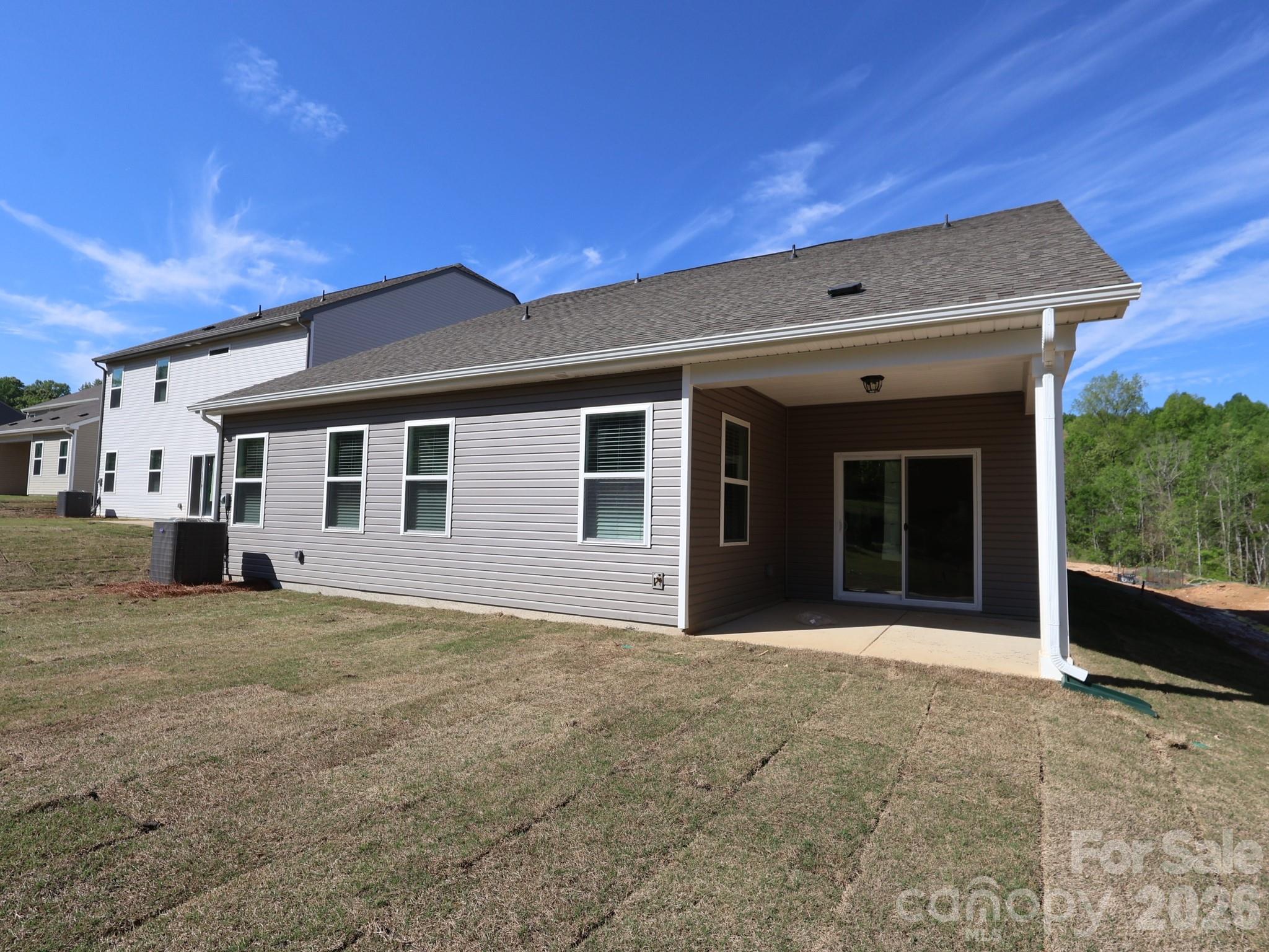 1711 Boulder Rdg Drive Gastonia, NC 28052 - Photo 2 of 8 a front view of a house with a garden
