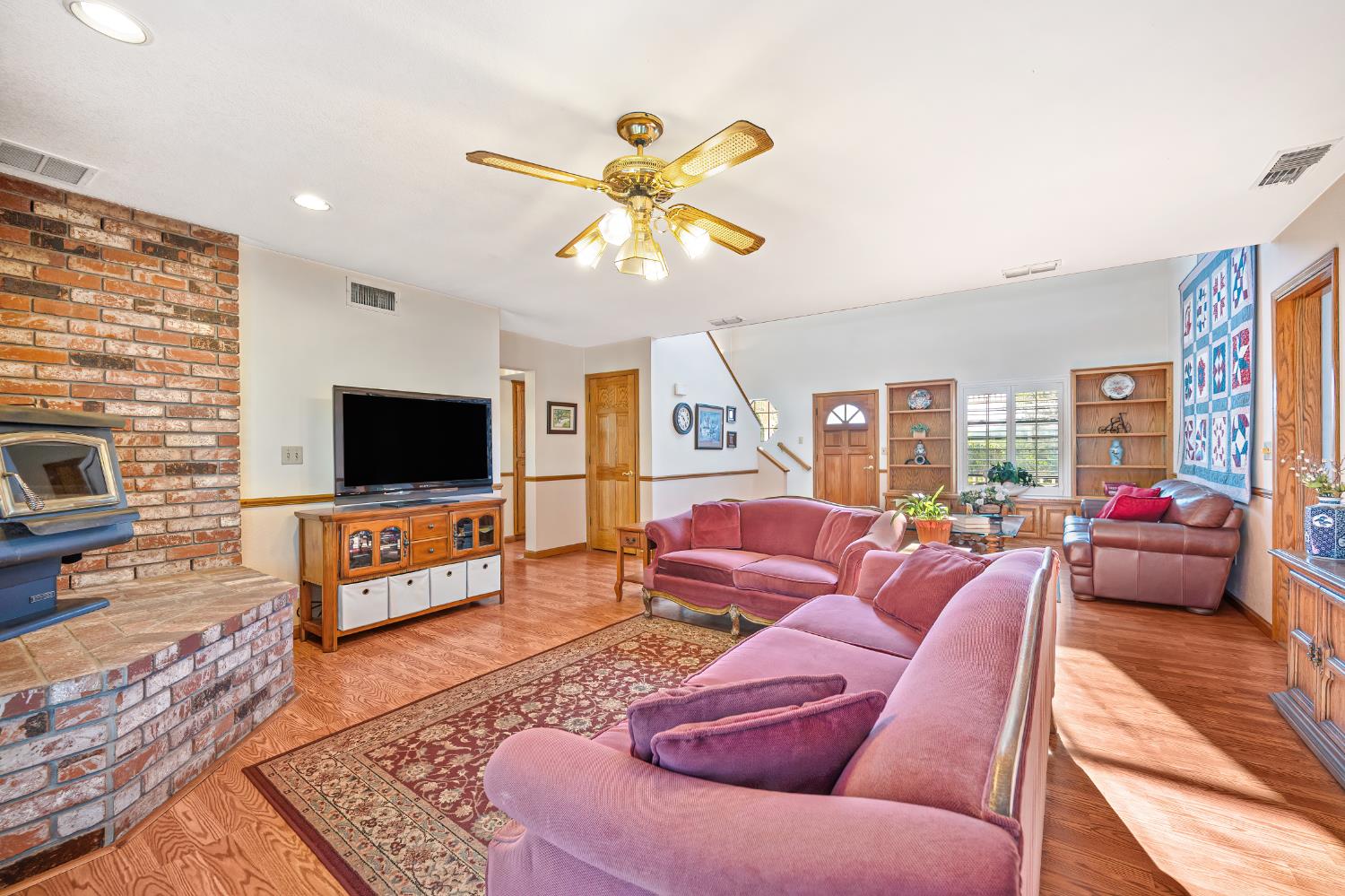 14470 Riva Ridge Circle Auburn, CA 95602 - Photo 11 of 71 a living room with furniture and a flat screen tv