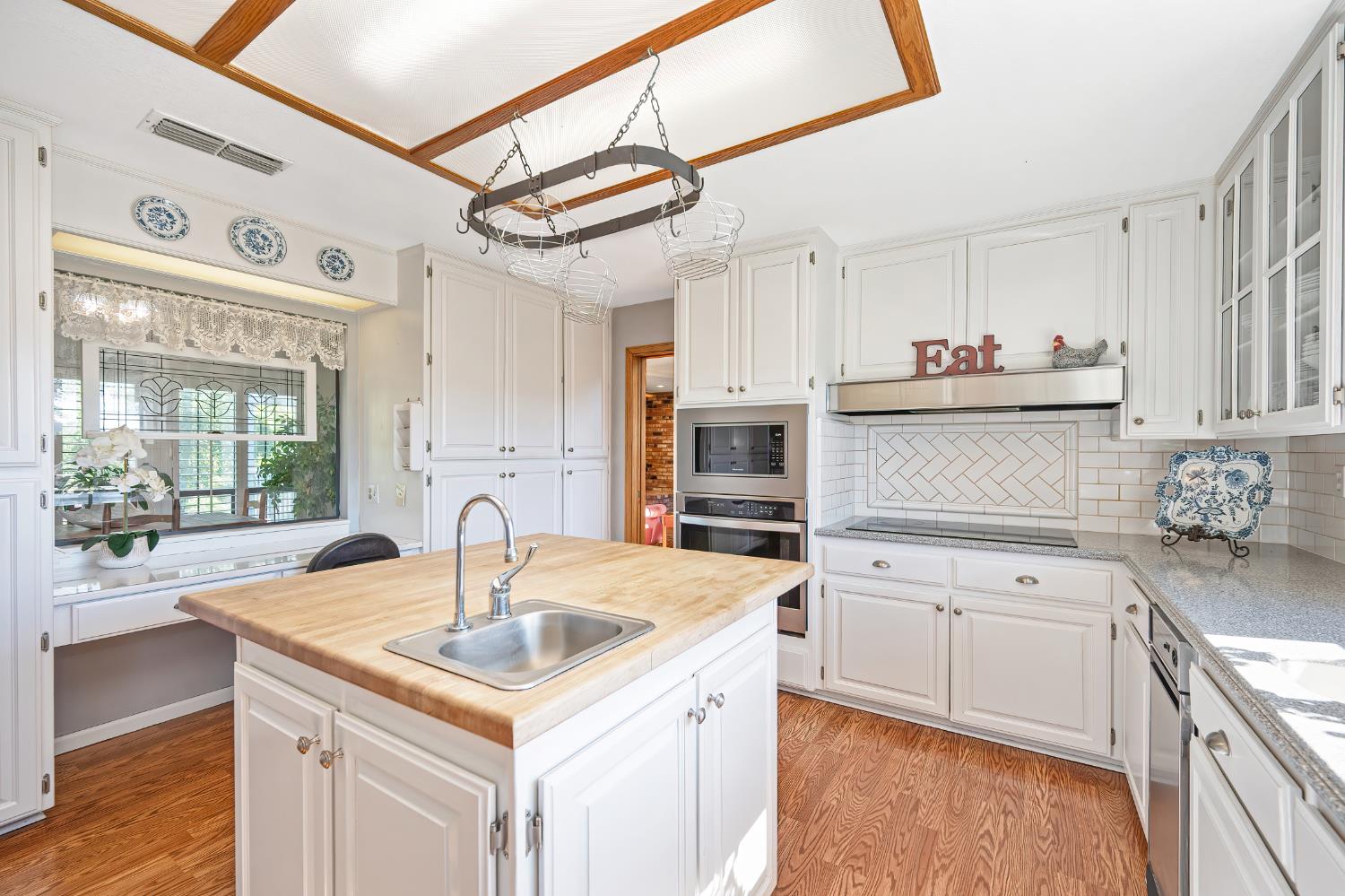 14470 Riva Ridge Circle Auburn, CA 95602 - Photo 17 of 71 a kitchen with stainless steel appliances granite countertop a sink and cabinets