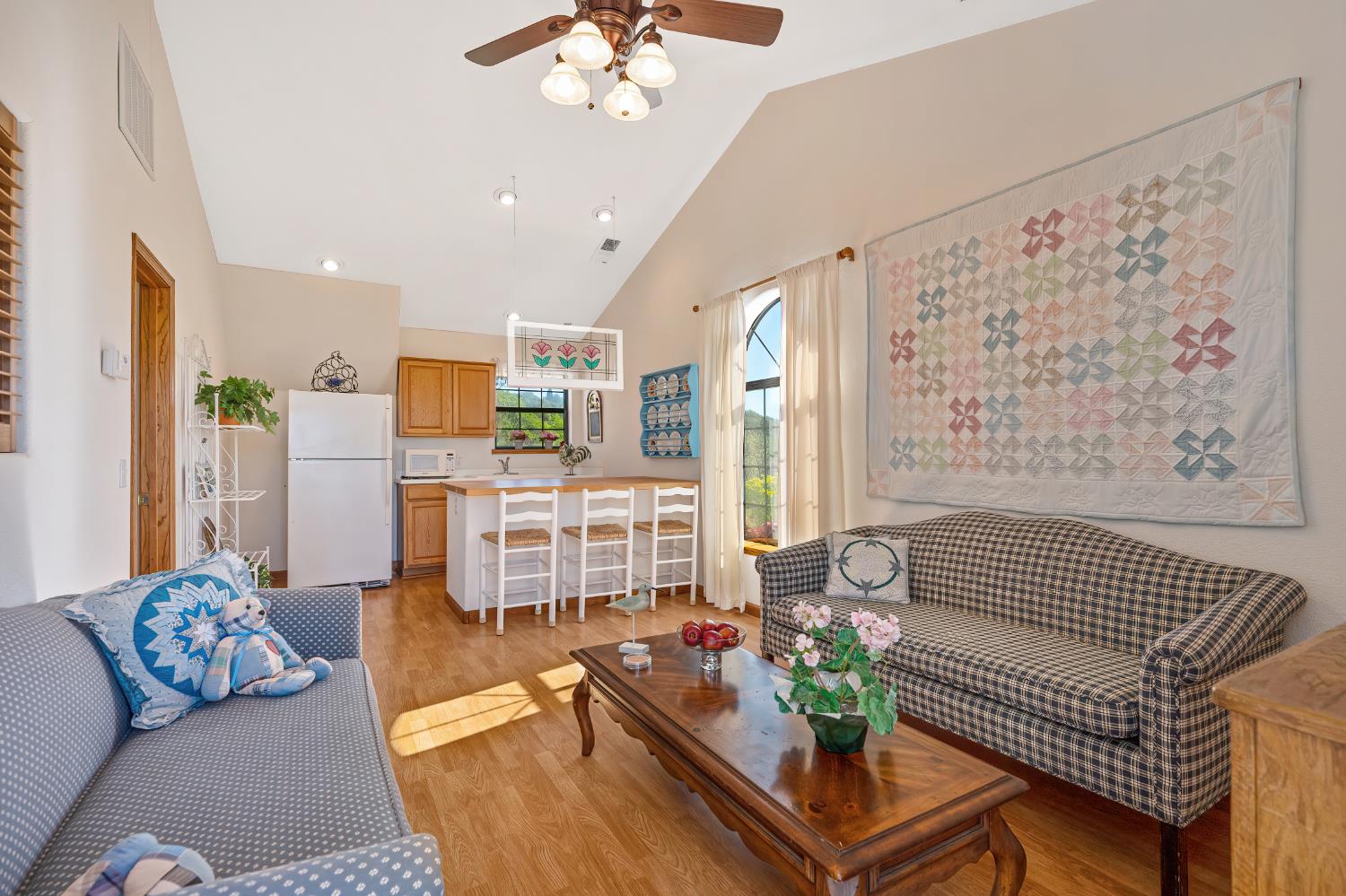 14470 Riva Ridge Circle Auburn, CA 95602 - Photo 31 of 71 a living room with furniture and wooden floor
