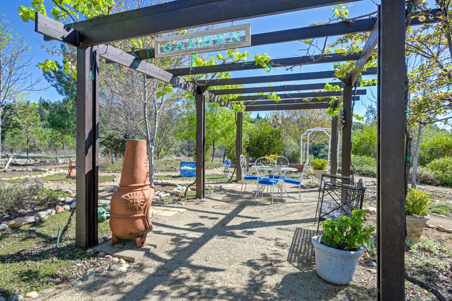14470 Riva Ridge Circle Auburn, CA 95602 - Photo 63 of 71 a view of a porch with chairs and backyard