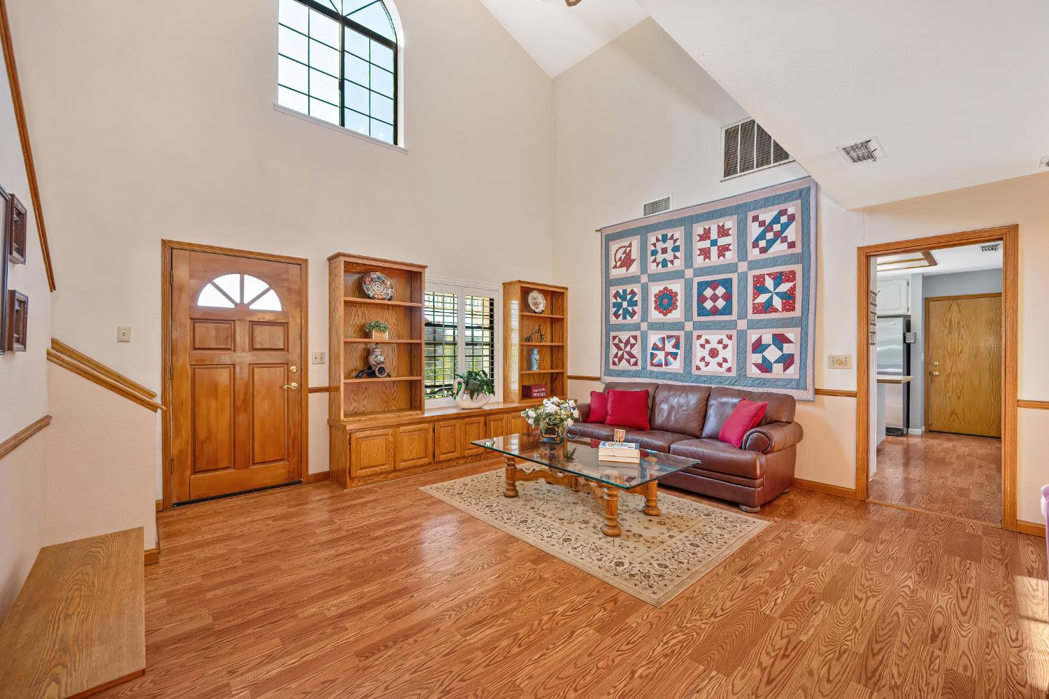 14470 Riva Ridge Circle Auburn, CA 95602 - Photo 8 of 71 a living room with furniture and a book shelf