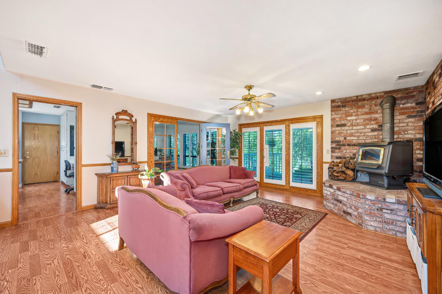 14470 Riva Ridge Circle Auburn, CA 95602 - Photo 10 of 71 a living room with furniture large window and wooden floor