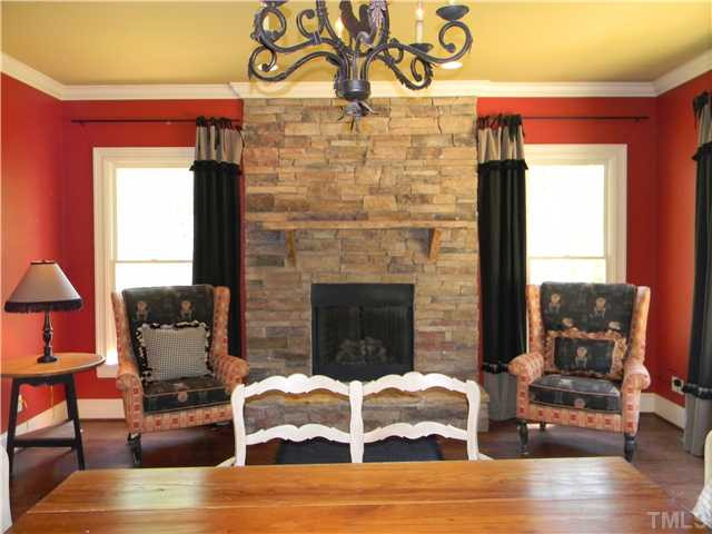 7620 Graylyn Drive Raleigh, NC 27612 - Photo 7 of 12 Eat in area with fire place