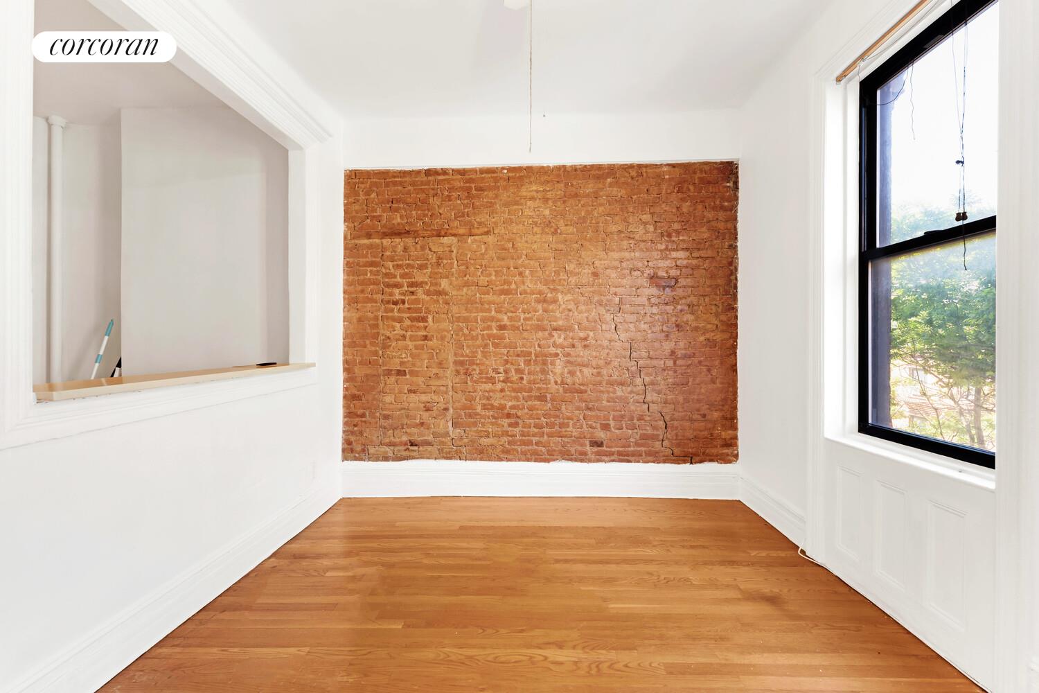 192 Bleecker Street, Unit 14 Manhattan, NY 10012 - Photo 10 of 17 a view of an empty room with windows
