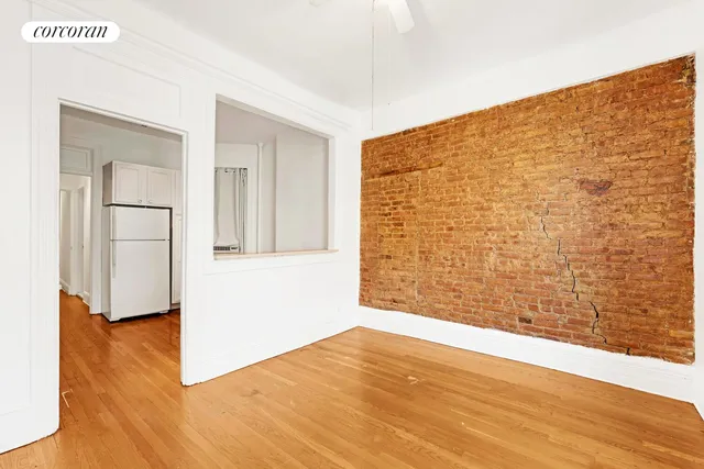 a view of an empty room with windows