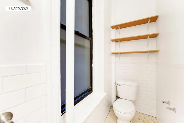 a bathroom with a sink and shower