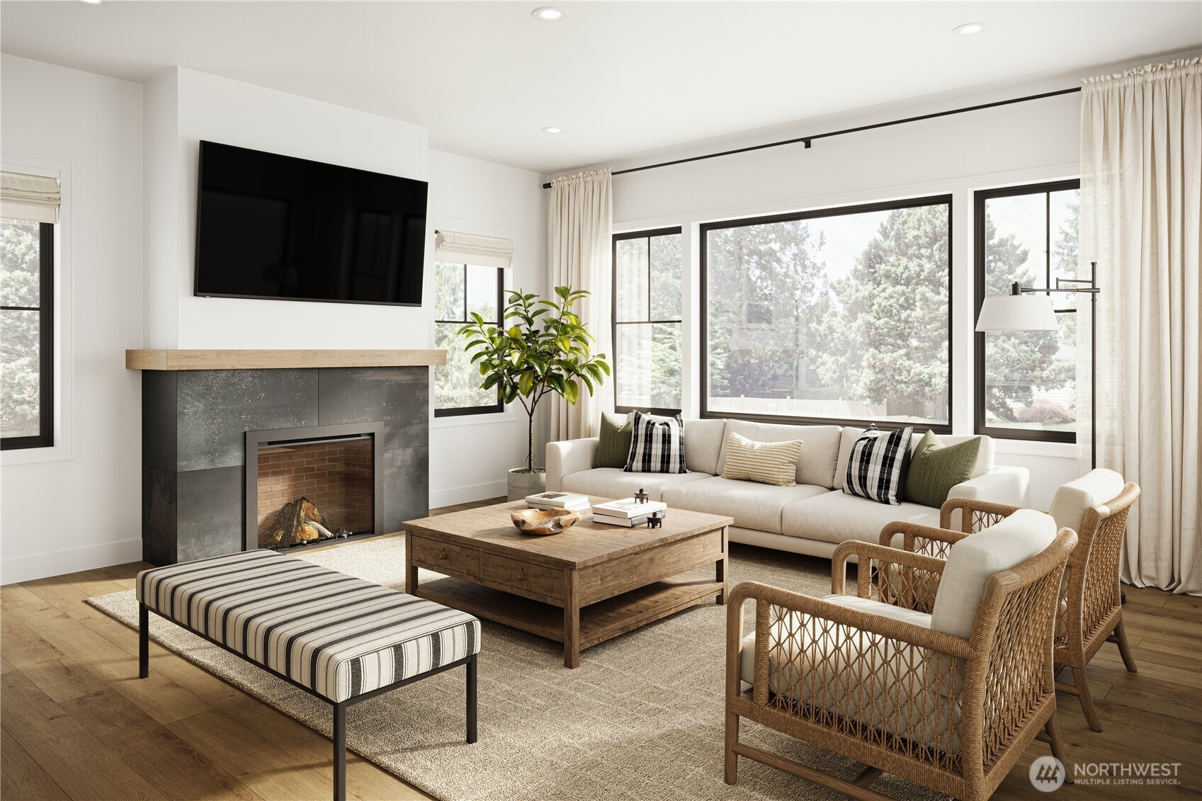 2618 29th Avenue West Seattle, WA 98199 - Photo 5 of 11 a living room with furniture a flat screen tv and a fireplace