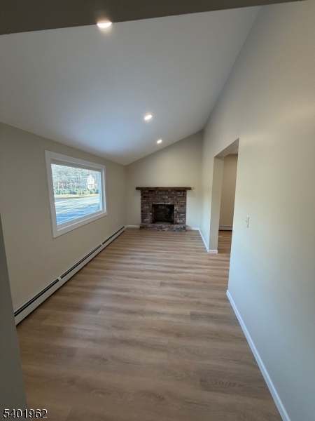 55 Highway 181 Lake Hopatcong, NJ 07849 - Photo 4 of 10 a bedroom with a bed and a window