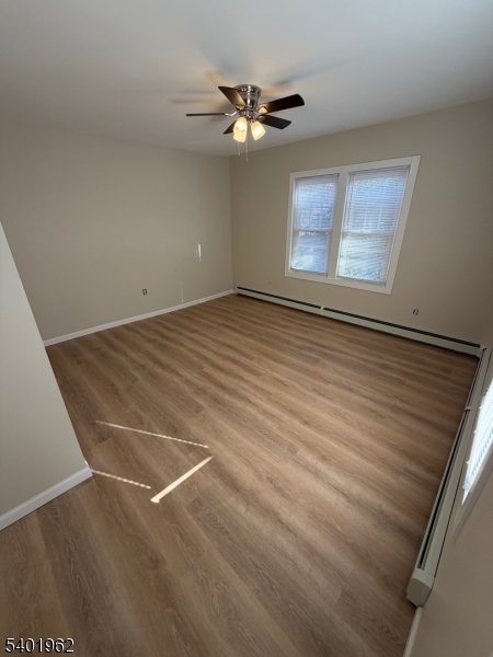 55 Highway 181 Lake Hopatcong, NJ 07849 - Photo 5 of 10 wooden floor in an empty room with a window