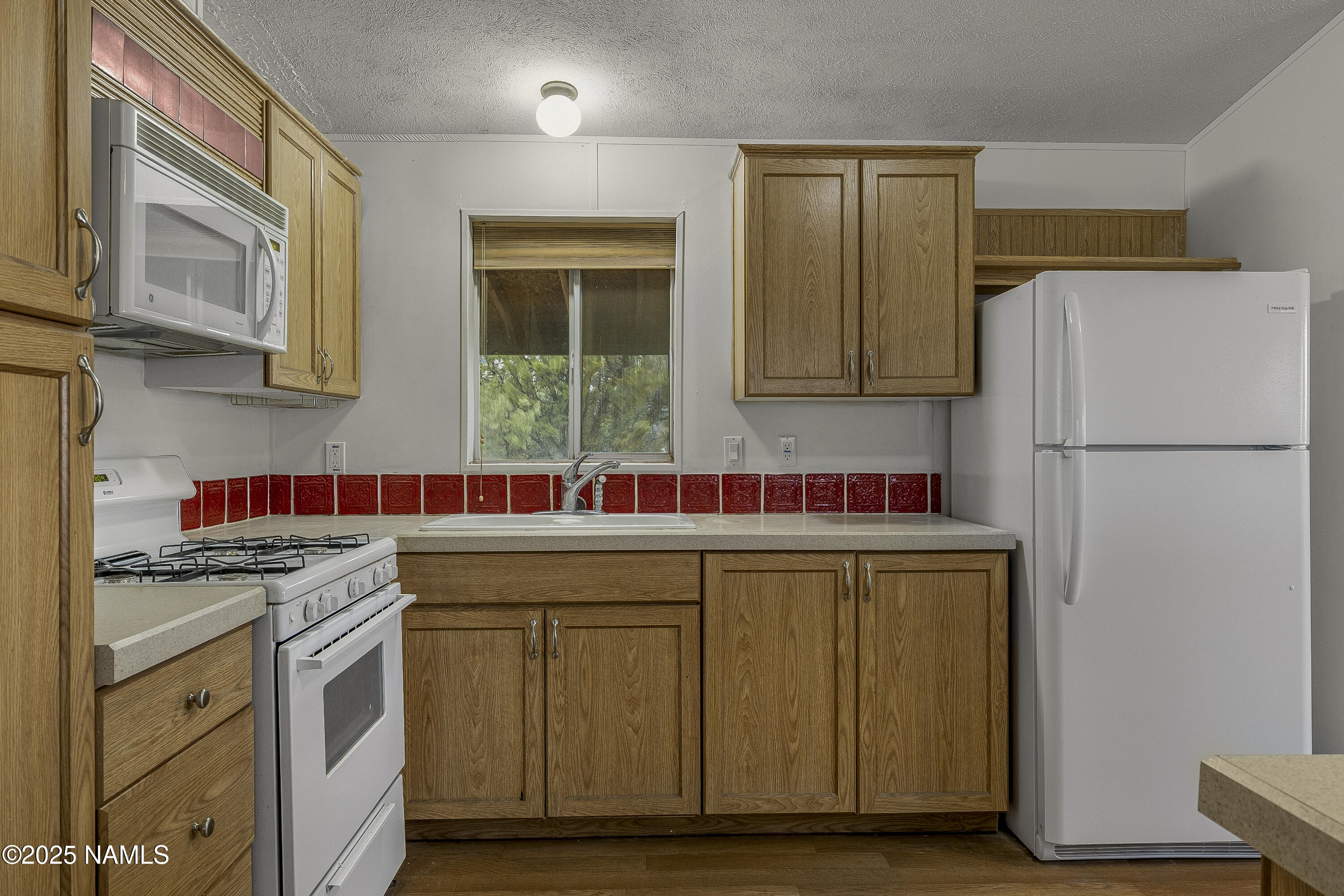 14412 Leupp Road Flagstaff, AZ 86004 - Photo 6 of 27 14412 Kitchen 1